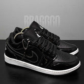 Tênis Air Jordan 1 Low - Branco/Preto Verniz
